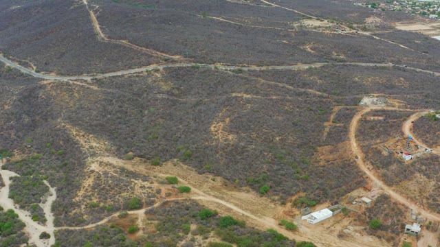 LA PLAYITA LOS CABOS MEXICO-2021: Vehicle Traveling on Winding Dirt Roads Through Hilly Terrain