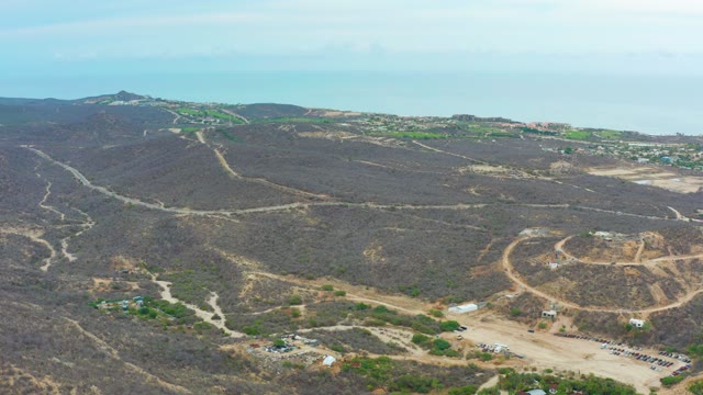 LA PLAYITA LOS CABOS MEXICO-2021: Hilly Landscape with Dirt Roads and Development Area