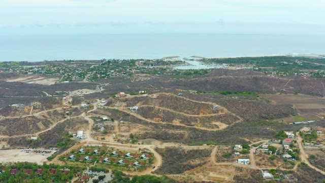 LA PLAYITA LOS CABOS MEXICO-2021: Hilly Coastal Development with Dunes and Buildings
