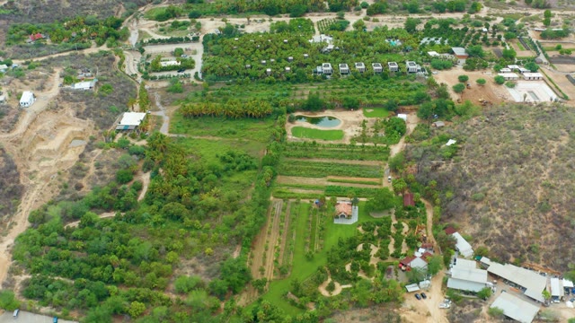 LA PLAYITA LOS CABOS MEXICO-2021: Aerial Pan of Rural Estate with Fields and Pool