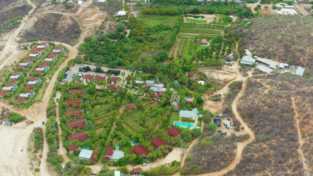 LA PLAYITA LOS CABOS MEXICO-2021: Rural Settlement with Terraced Fields and Dirt Roads
