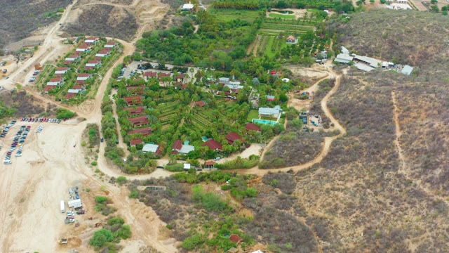 LA PLAYITA LOS CABOS MEXICO-2021: Rural Settlement with Parking Lot and Vehicle Movement