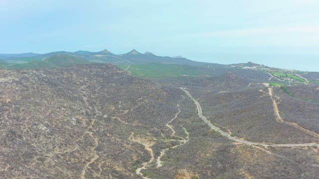 LA PLAYITA LOS CABOS MEXICO-2021: Winding Mountain Roads in Arid Terrain