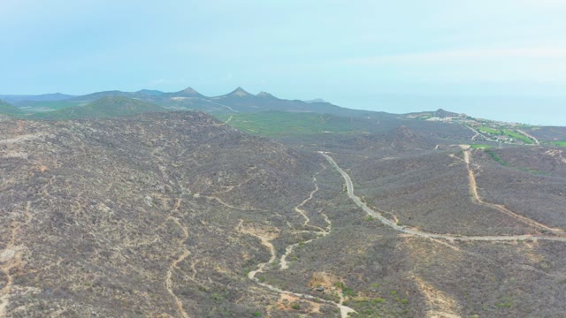 LA PLAYITA LOS CABOS MEXICO-2021: Vehicle Moving Along Winding Mountain Road