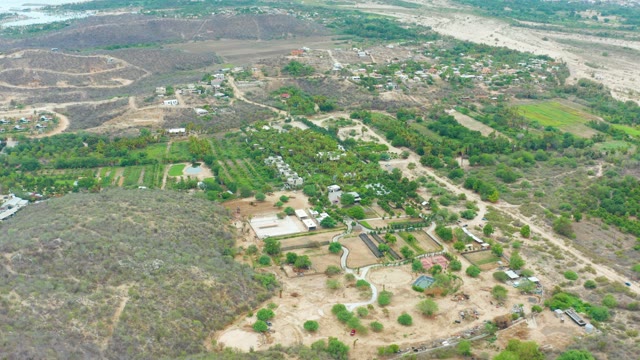 LA PLAYITA LOS CABOS MEXICO-2021: Vehicles Traveling on Rural Farm Roads and Fields