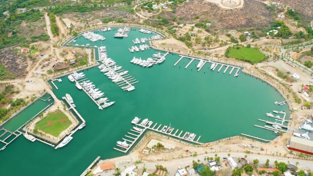 LA PLAYITA LOS CABOS MEXICO-2021: Marina with Docked Boats and Calm Green Water