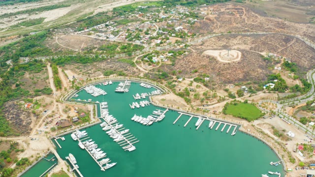 LA PLAYITA LOS CABOS MEXICO-2021: Marina Boats and Road Vehicles in Motion