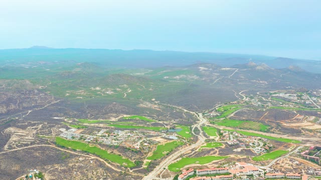 LA PLAYITA LOS CABOS MEXICO-2021: Mountainous Landscape with Green Fields and Roads