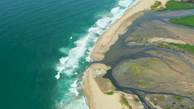 LA PLAYITA LOS CABOS MEXICO-2021: River Merging with Ocean Waves at Coastline