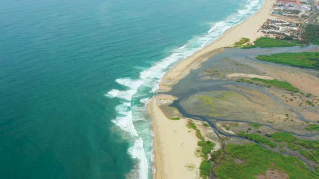 LA PLAYITA LOS CABOS MEXICO-2021: Ocean Waves Crashing on Sandy Shore with Estuaries