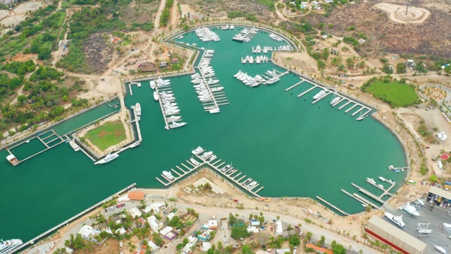 LA PLAYITA LOS CABOS MEXICO-2021: Boat Moving In and Out of Marina Dock