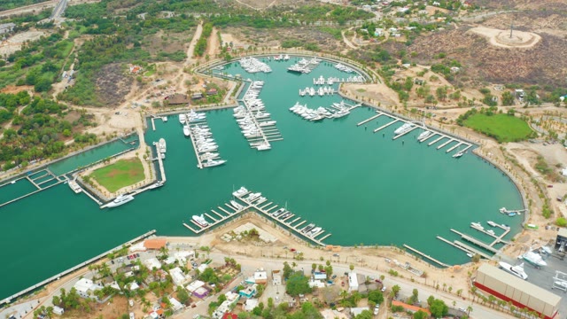 LA PLAYITA LOS CABOS MEXICO-2021: Marina Boats Gently Moving in Calm Waters
