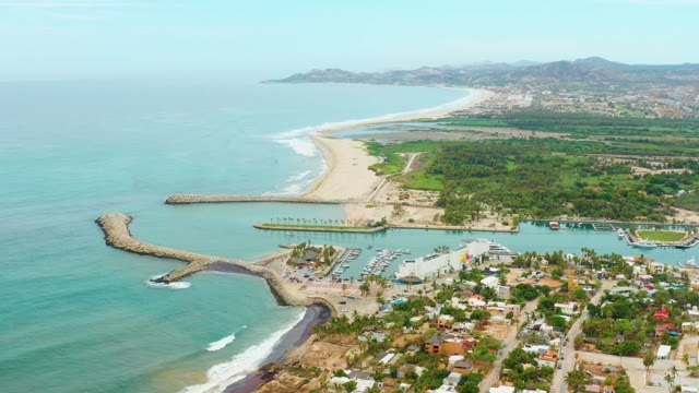 LA PLAYITA LOS CABOS MEXICO-2021: Coastal Town with Ocean Waves and Harbor