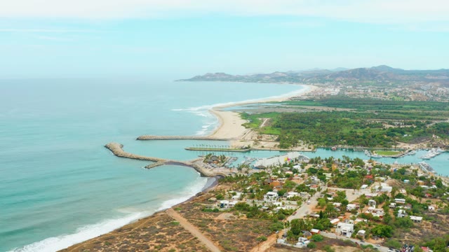 LA PLAYITA LOS CABOS MEXICO-2021: Gentle Ocean Waves Lapping Sandy Shore