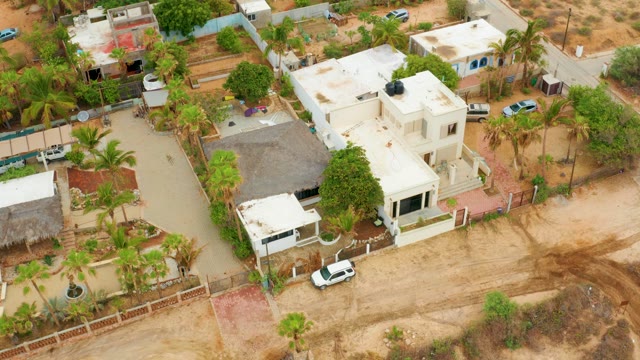 LA PLAYITA LOS CABOS MEXICO-2021: Residential Area with Palm Trees and Car Movement