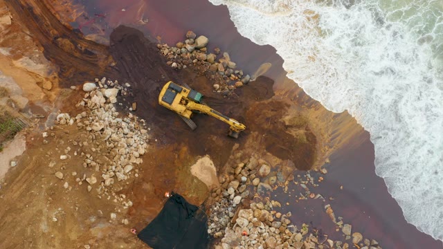 LA PLAYITA LOS CABOS MEXICO-2021: Heavy Machinery Clearing Polluted Shoreline