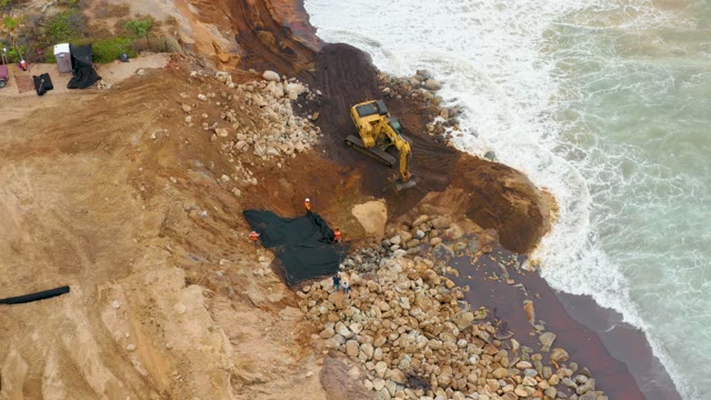 LA PLAYITA LOS CABOS MEXICO-2021: Excavator Working on Coastal Erosion Control