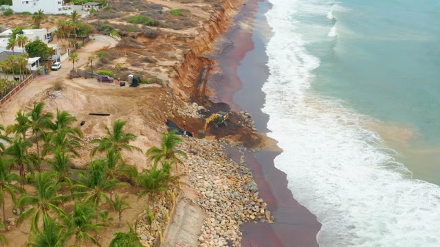 LA PLAYITA LOS CABOS MEXICO-2021: Eroding Cliff and Ocean Waves at Beach
