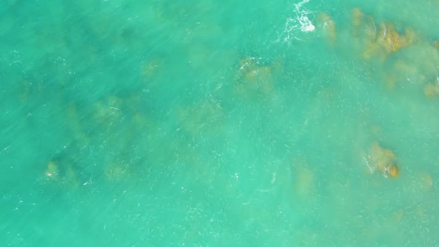 EL TULE BEACH LOS CABOS BCS MEXICO-2021: Turquoise Ocean Water with Submerged Rocks