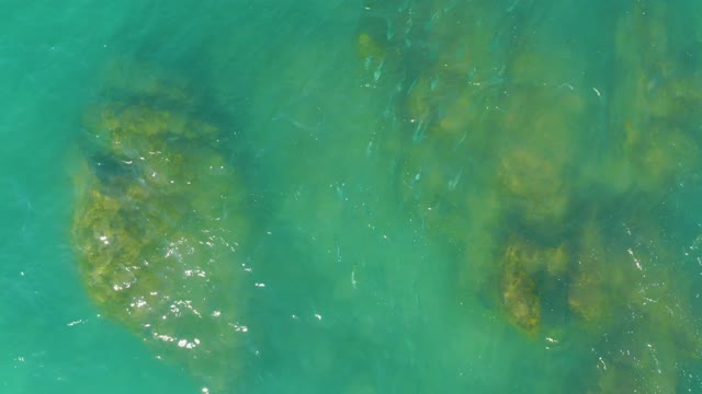 EL TULE BEACH LOS CABOS BCS MEXICO-2021: Clear Turquoise Water Over Submerged Rocks