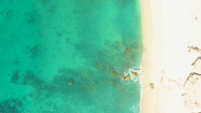 EL TULE BEACH LOS CABOS BCS MEXICO-2021: Gentle Ocean Waves Meeting Sandy Shore