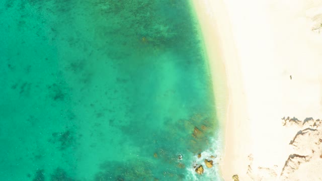 EL TULE BEACH LOS CABOS BCS MEXICO-2021: Turquoise Ocean Lapping White Sandy Shore