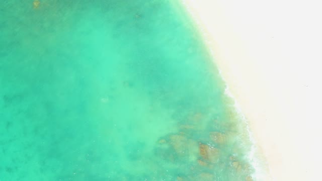EL TULE BEACH LOS CABOS BCS MEXICO-2021: Gentle Waves Lapping Sandy Turquoise Shore