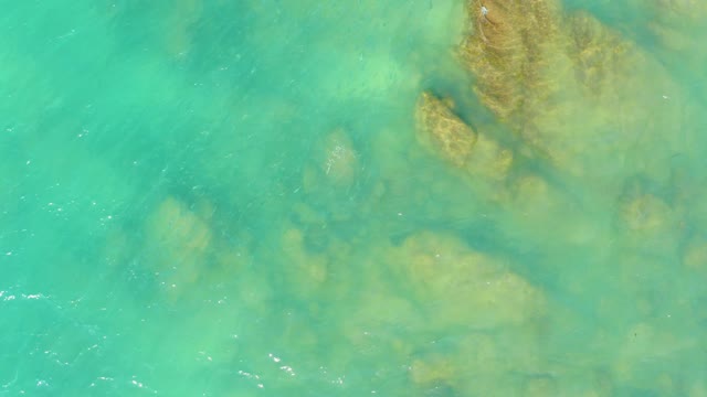 EL TULE BEACH LOS CABOS BCS MEXICO-2021: Clear Turquoise Water Over Rocky Seabed