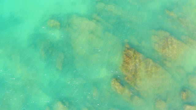 EL TULE BEACH LOS CABOS BCS MEXICO-2021: Clear Turquoise Water Over Rocky Seabed