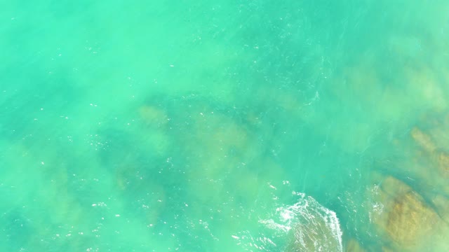 EL TULE BEACH LOS CABOS BCS MEXICO-2021: Clear Turquoise Water Over Rocky Seabed