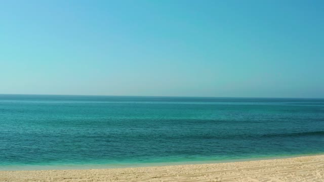 EL TULE BEACH LOS CABOS BCS MEXICO-2021: Sandy Beach and Turquoise Ocean with Tire Tracks