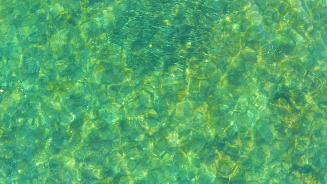 EL TULE BEACH LOS CABOS BCS MEXICO-2021: Gentle Ripples on Clear Turquoise Water Surface