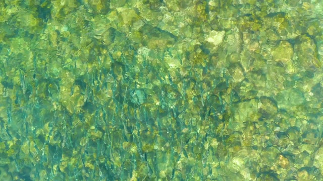 EL TULE BEACH LOS CABOS BCS MEXICO-2021: Rippling Clear Water Over Shallow Rock Bed