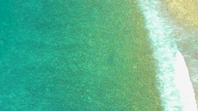 EL TULE BEACH LOS CABOS BCS MEXICO-2021: Gentle Ocean Waves Lapping Sandy Shore