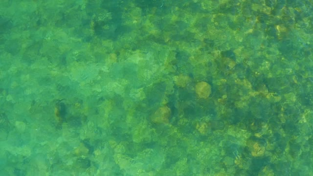 EL TULE BEACH LOS CABOS BCS MEXICO-2021: Rippling Clear Water Over Rocky Bottom