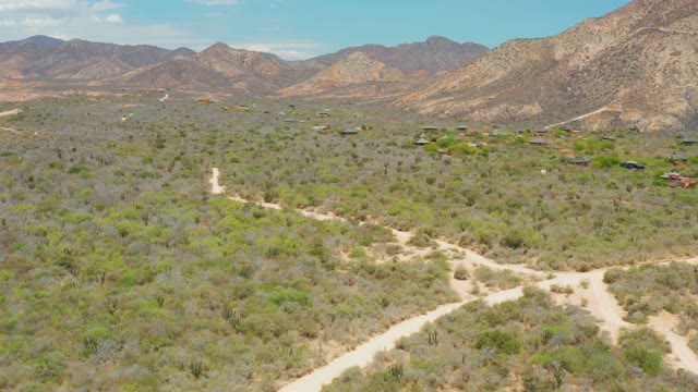 CABO PULMO LOS CABOS BCS MEXICO-2021: Desert Landscape with Dirt Roads and Mountain Backdrop