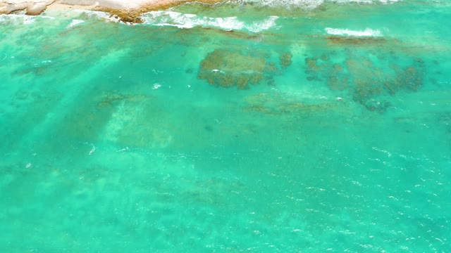 CABO PULMO LOS CABOS BCS MEXICO-2021: Clear Turquoise Water Lapping Against Rocky Shore
