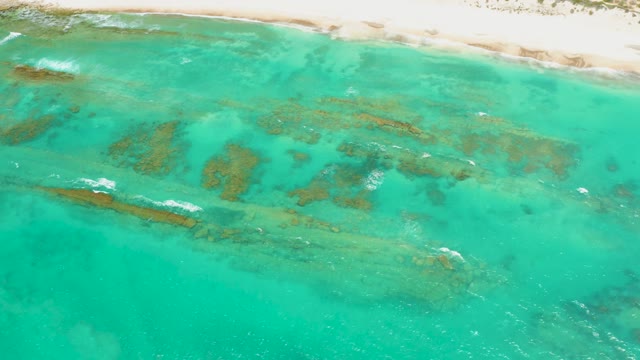 CABO PULMO LOS CABOS BCS MEXICO-2021: Clear Turquoise Ocean Water Over Sandy Shore