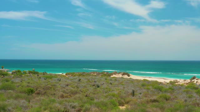 CABO PULMO LOS CABOS BCS MEXICO-2021: Coastal Dunes and Turquoise Ocean with Moving Clouds