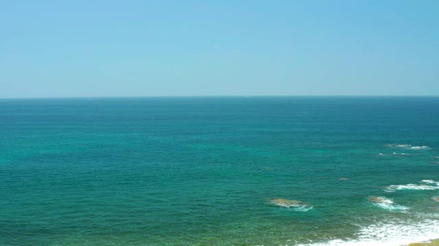 EL TULE BEACH LOS CABOS BCS MEXICO-2021: Waves Crashing on Turquoise Ocean Shore