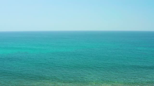 EL TULE BEACH LOS CABOS BCS MEXICO-2021: Ocean Waves Rolling Toward Sandy Shore