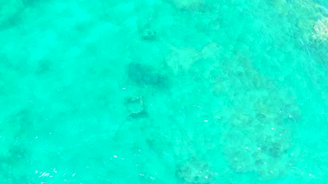 EL TULE BEACH LOS CABOS BCS MEXICO-2021: Clear Turquoise Water with Submerged Rocky Formations