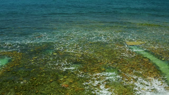 EL TULE BEACH LOS CABOS BCS MEXICO-2021: Receding Tide Exposing Rocky Seabed