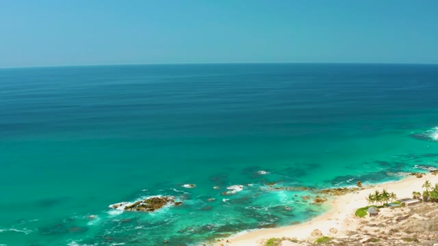 DREAMS LOS CABOS BCS MEXICO-2021: Waves Breaking on Sandy Shore From Elevated View