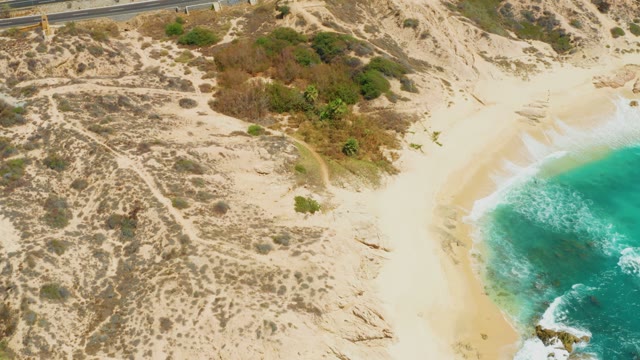 DREAMS LOS CABOS BCS MEXICO-2021: Person Walking on Coastal Dunes by the Ocean