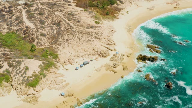 DREAMS LOS CABOS BCS MEXICO-2021: Sandy Shore with Turquoise Ocean and Rocky Outcrops