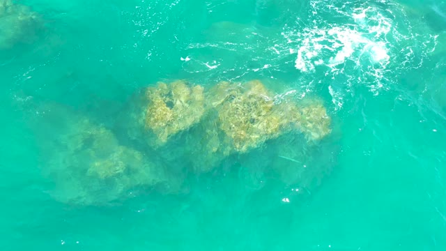 DREAMS LOS CABOS BCS MEXICO-2021: Rocky Seabed Visible Through Clear Turquoise Water