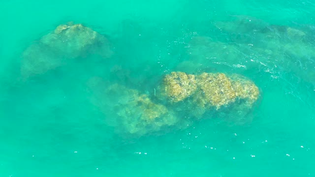 DREAMS LOS CABOS BCS MEXICO-2021: Clear Turquoise Water over Submerged Rocks