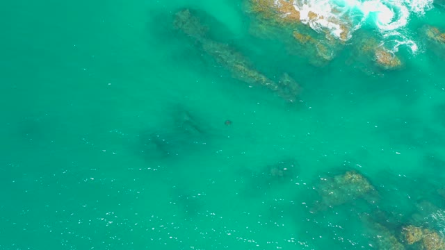 DREAMS LOS CABOS BCS MEXICO-2021: Waves Receding Over Shallow Ocean Rocks