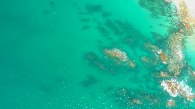 DREAMS LOS CABOS BCS MEXICO-2021: Gentle Waves Lapping Rocky Shoreline From Above